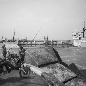 Mahury at the Harbor Head of Scheveningen | Dredger and Fishermen in Urban Coastal Photography
